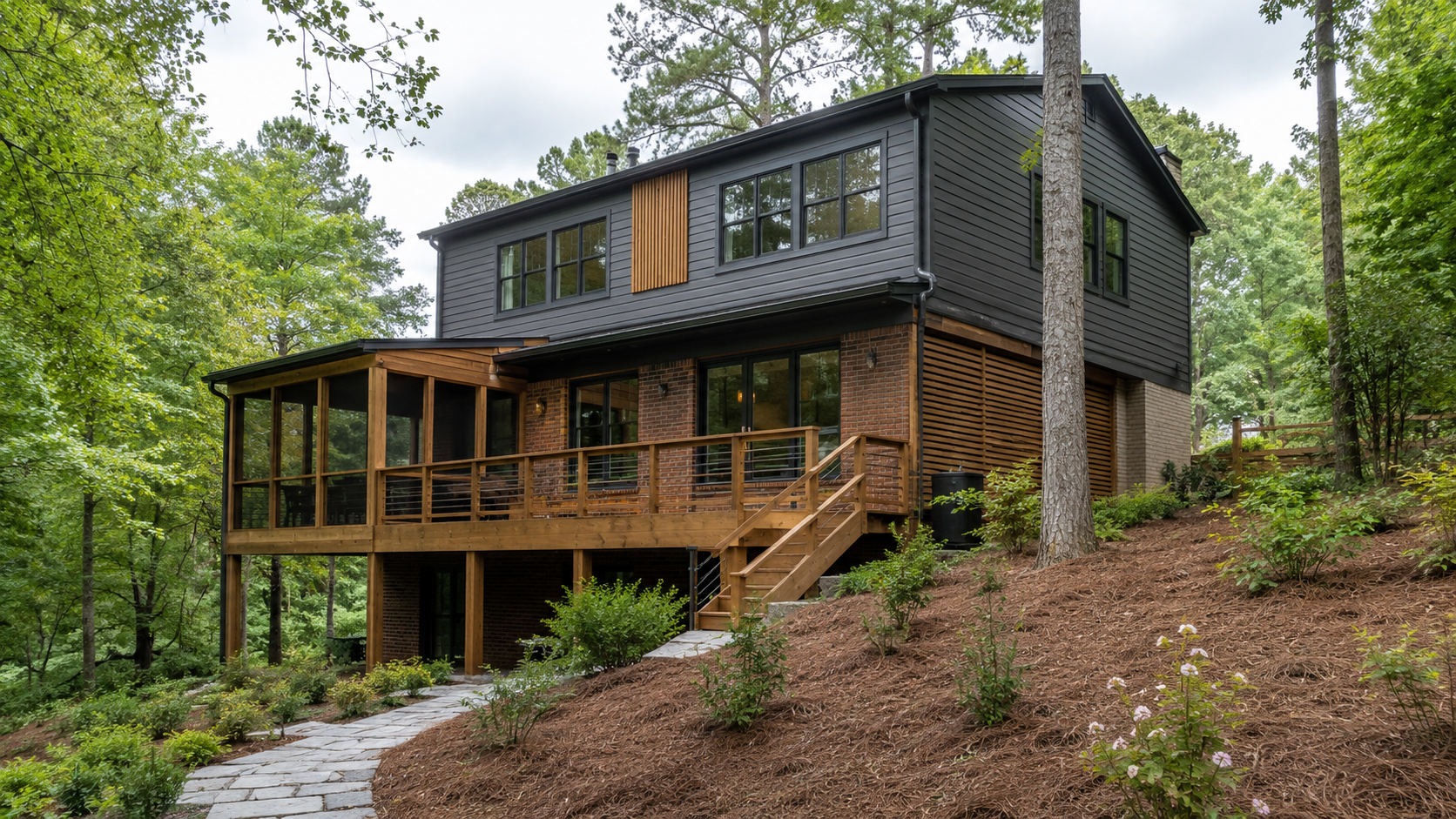 Modern custom second-story addition on a wooded Triangle lot, built by Forge Construction Group