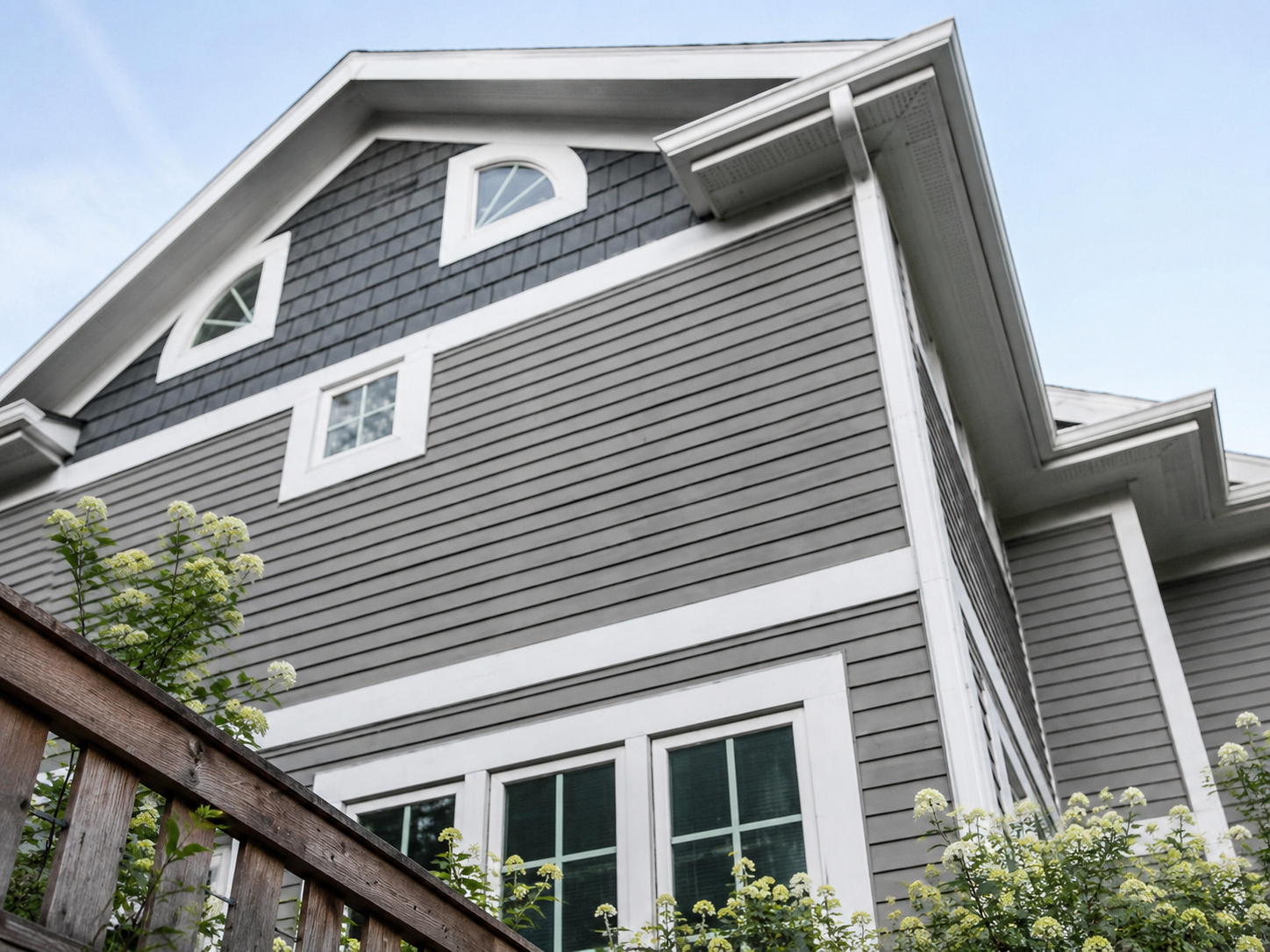 Close-up of James Hardie lap and shingle fiber cement siding on a Triangle NC home