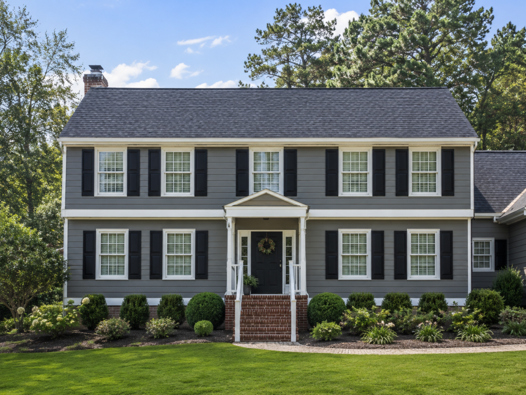 Dark gray James Hardie fiber cement siding professionally installed on a Raleigh NC home