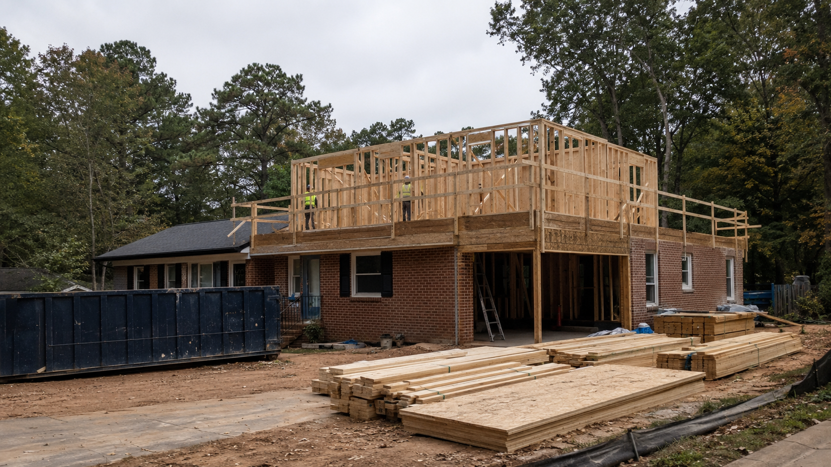 Second-story addition framed over an existing Triangle home, showing Forge Construction Group's structural work