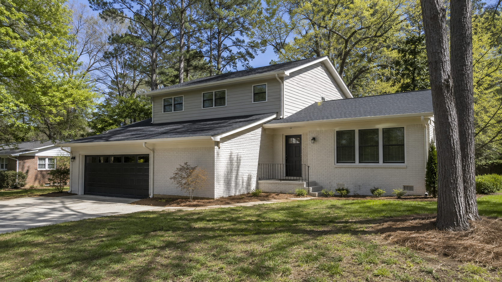 Second-story addition built up over a single-story ranch home in the Triangle, by Forge Construction Group