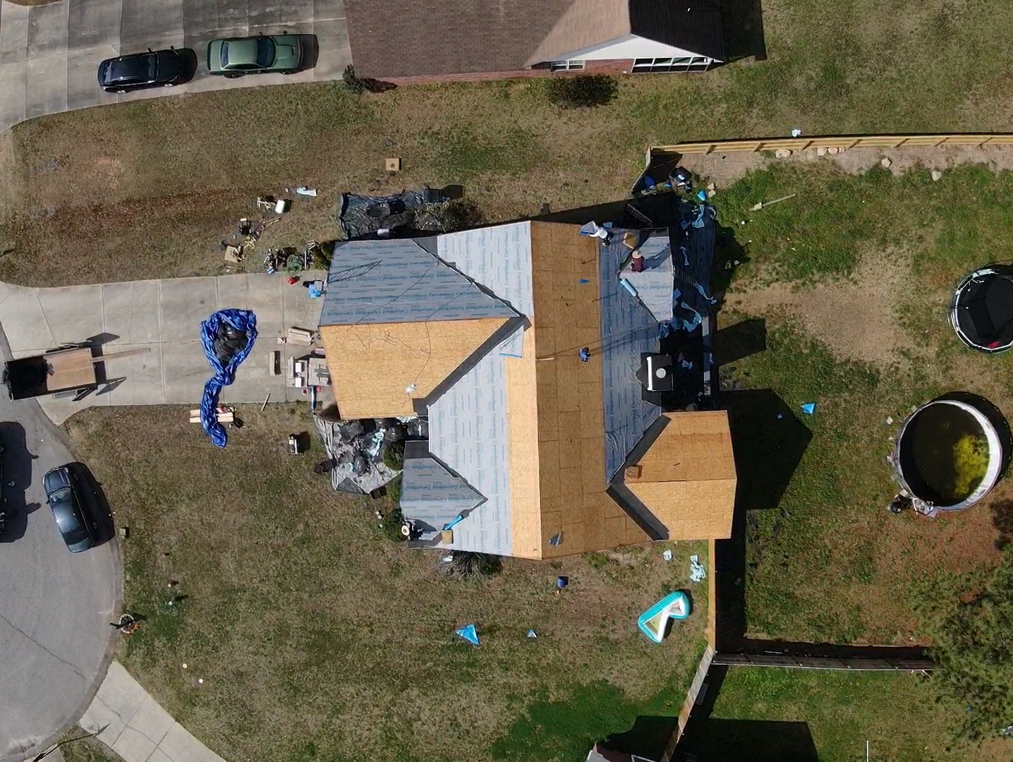 Roof replacement in progress by the Forge Construction Group crew